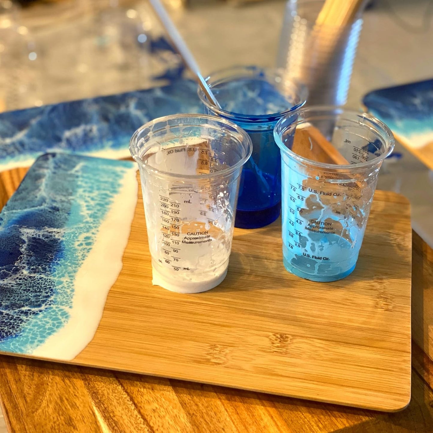 [100 Pack] NEW SIZE 12oz Graduated Mixing Cups - Durable PET, Clear Measurement Markings in oz, mL and cups - For Resin, Paint, Mixing and Crafts